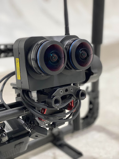 Close-up of the dual-lens ZCAM K1 PRO 180° camera mounted on the production rig