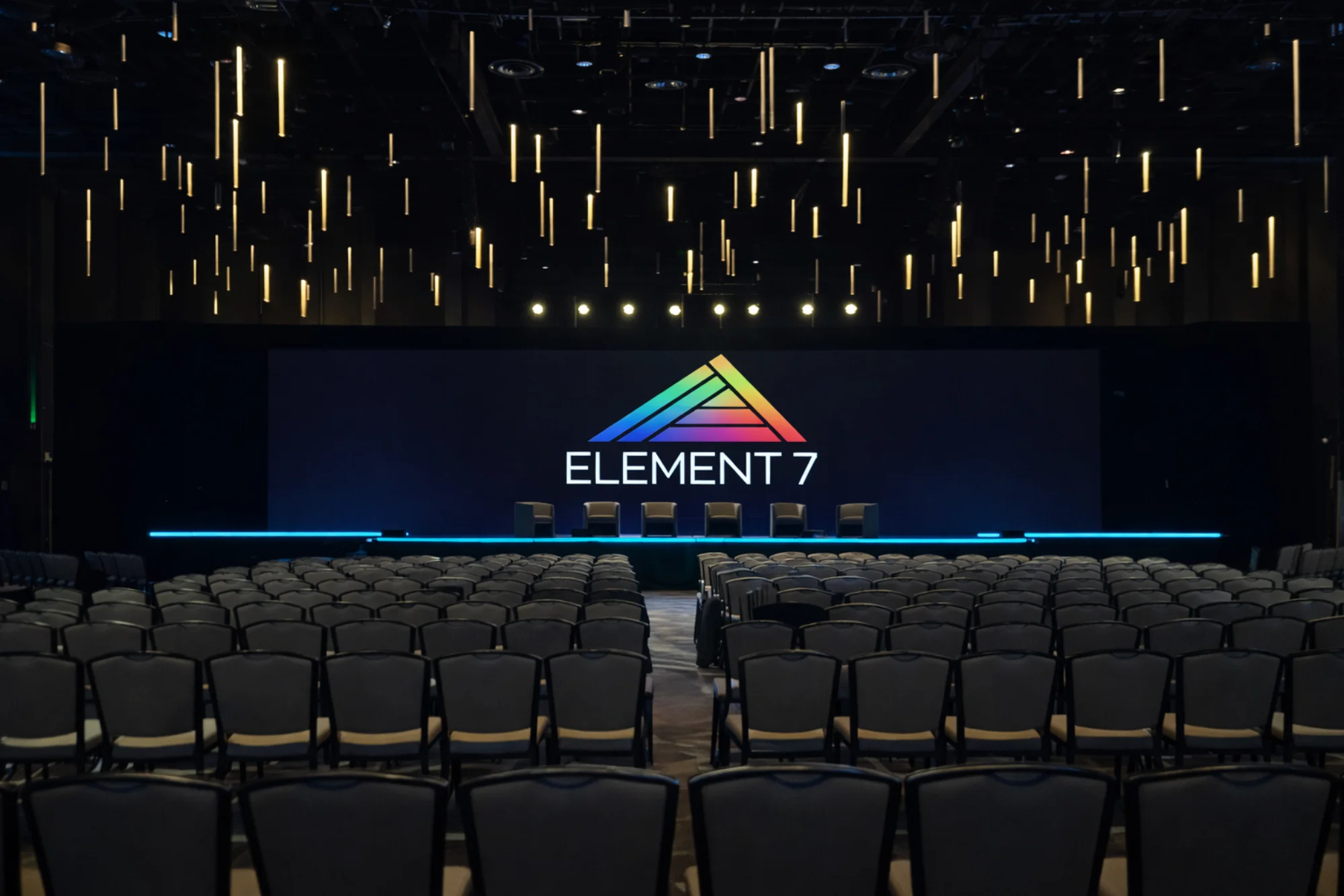 Element 7 branded event stage with audience seating