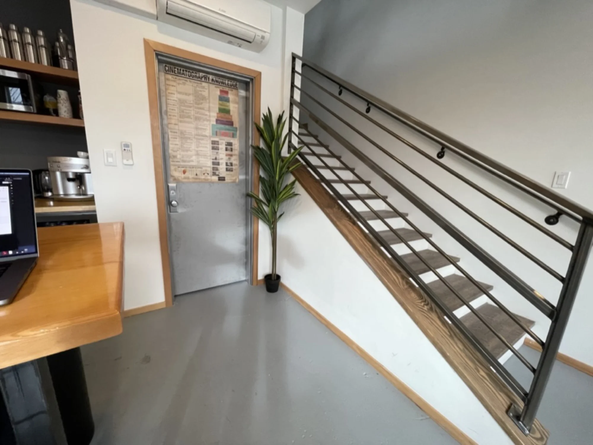 Studio entrance stairwell and workspace access